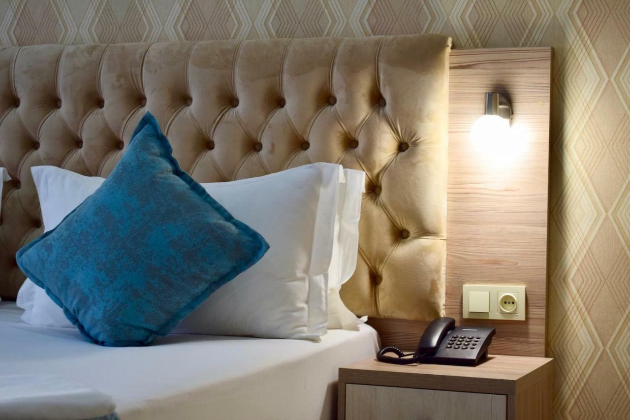 Dostar Inn Σιμκέντ Εξωτερικό φωτογραφία